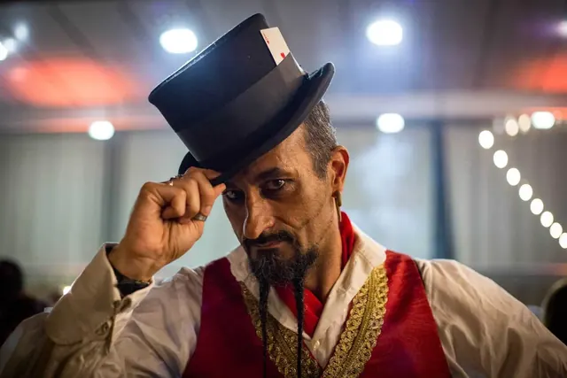 Ringmaster in a top hat at Continental's Circus party