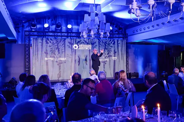 Stage with blue lighting at the Meliá Members Fest