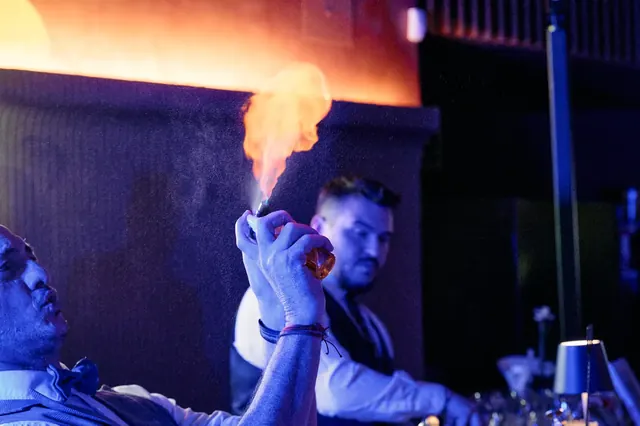 Chef flambéing at the Logitech event